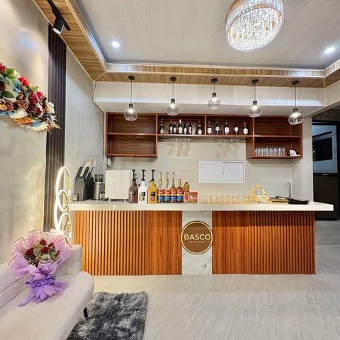 The warm wood café counter and seating inside BASCO